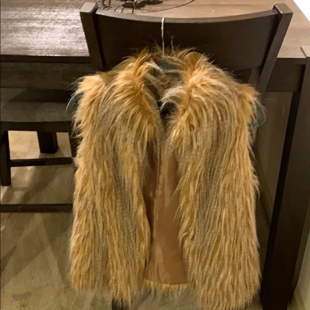 A women’s fur vest